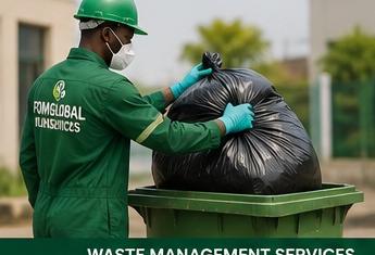 Staff collecting waste bags